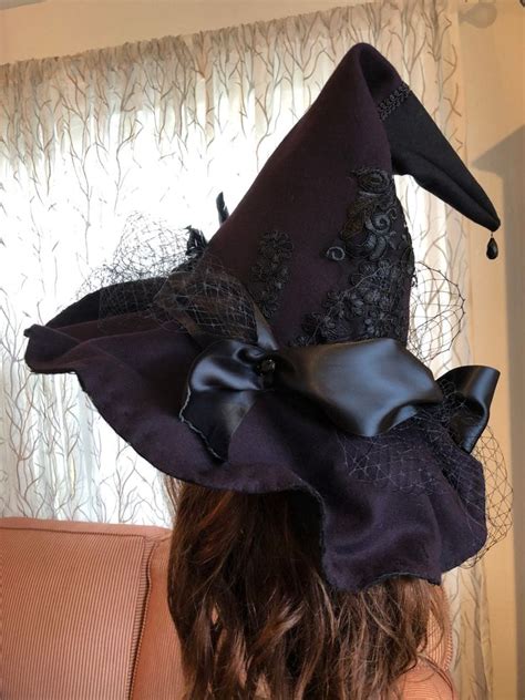 From Spellcasting to Style: The Evolution of the Black Lacr Witch Hat